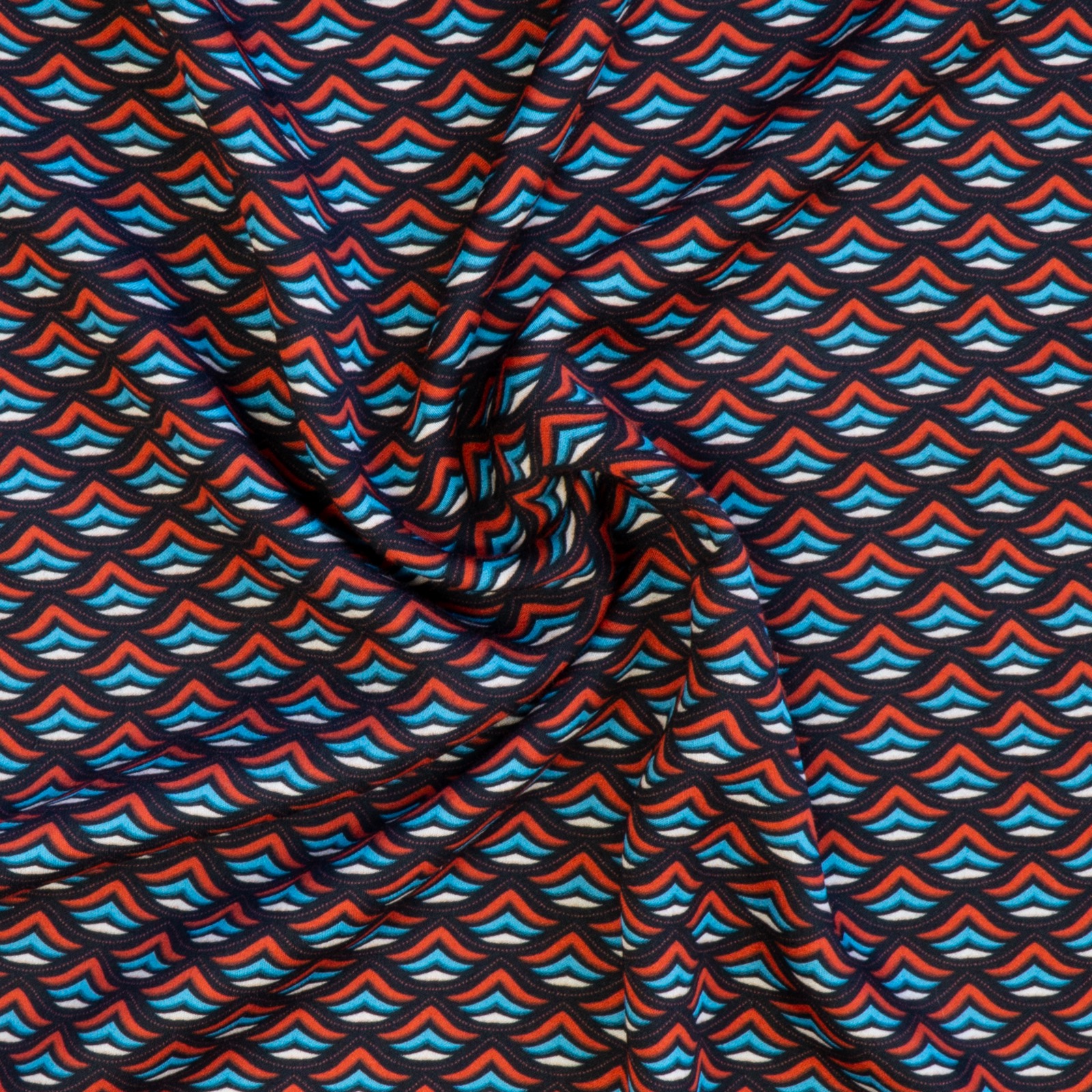Javanaise, grafisch gemustert, schwarz, rot, cyan